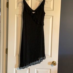 Super cute little black sleeveless party dress.